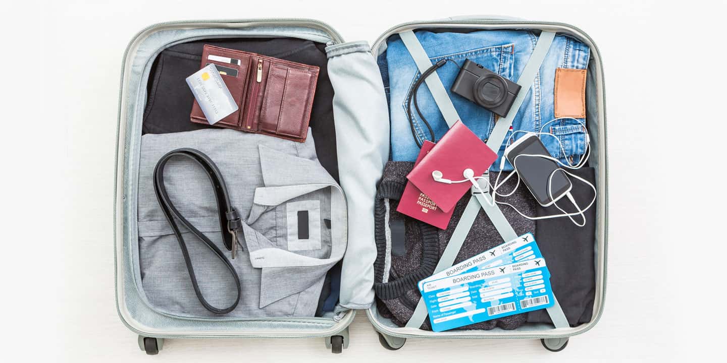 Image of travel bag with clothes and other accessories